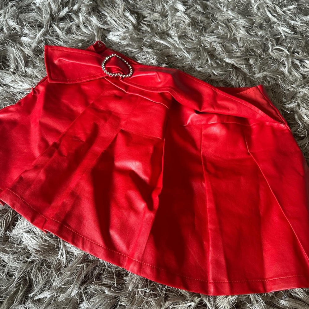 More to come red leather skirt